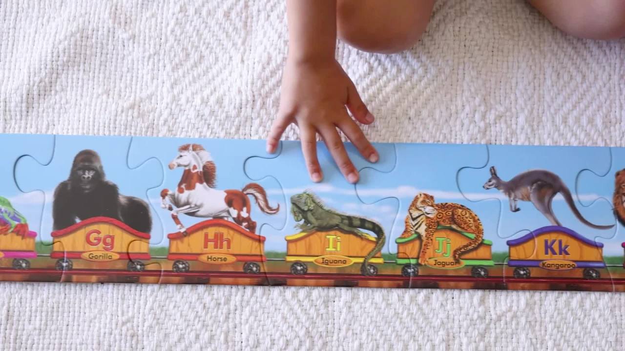 thumbnail video image 2 of Melissa & Doug Alphabet Train Jumbo Jigsaw Floor Puzzle - Letters and Animals (28 pcs, 10 feet long) - FSC Certified, 2 of 10