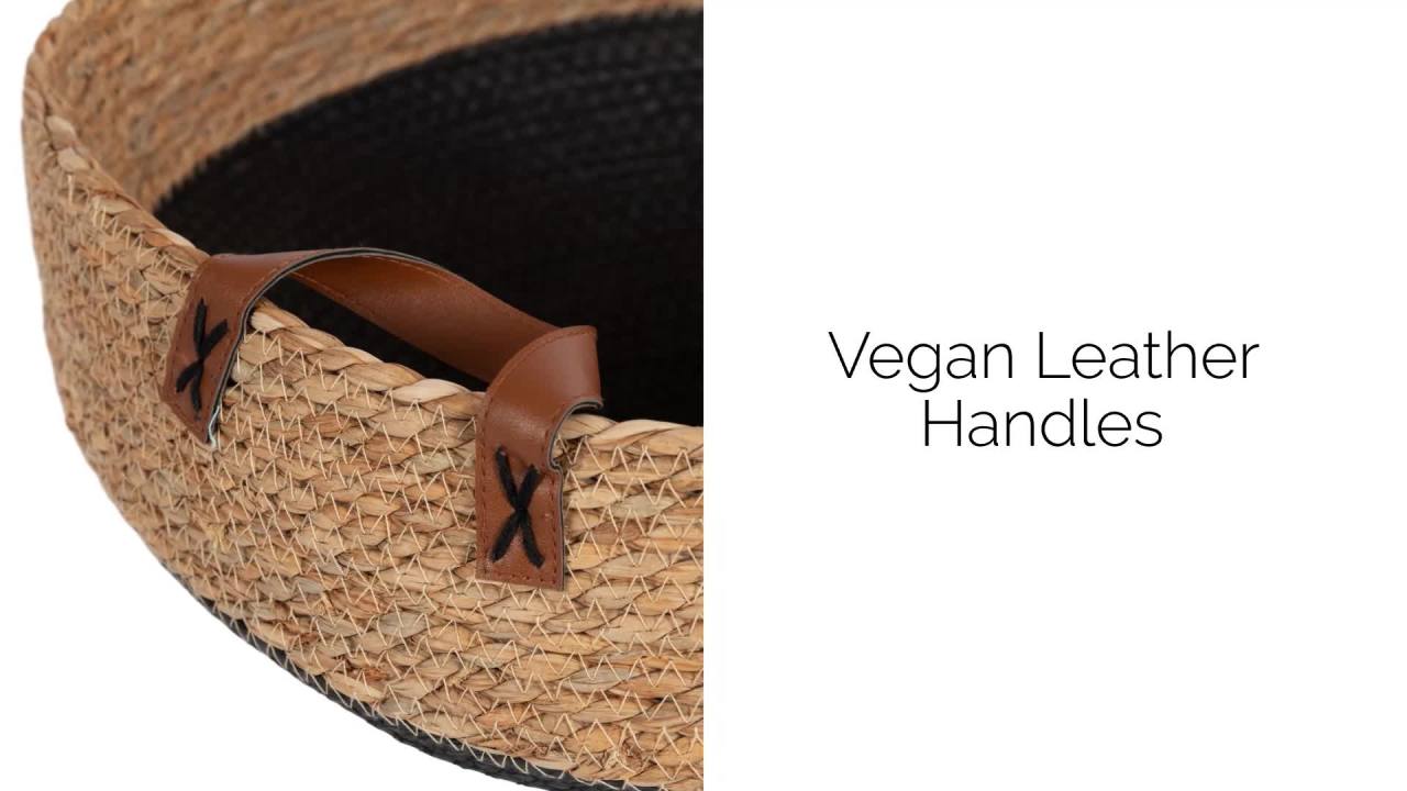 thumbnail video image 2 of Kate and Laurel Chopra Transitional Woven Seagrass Storage Basket with Handles, 20 x 10, Natural Seagrass and Black, Braided Round Basket for Use as Living Room Blanket Basket or Small Laundry Basket, 2 of 10