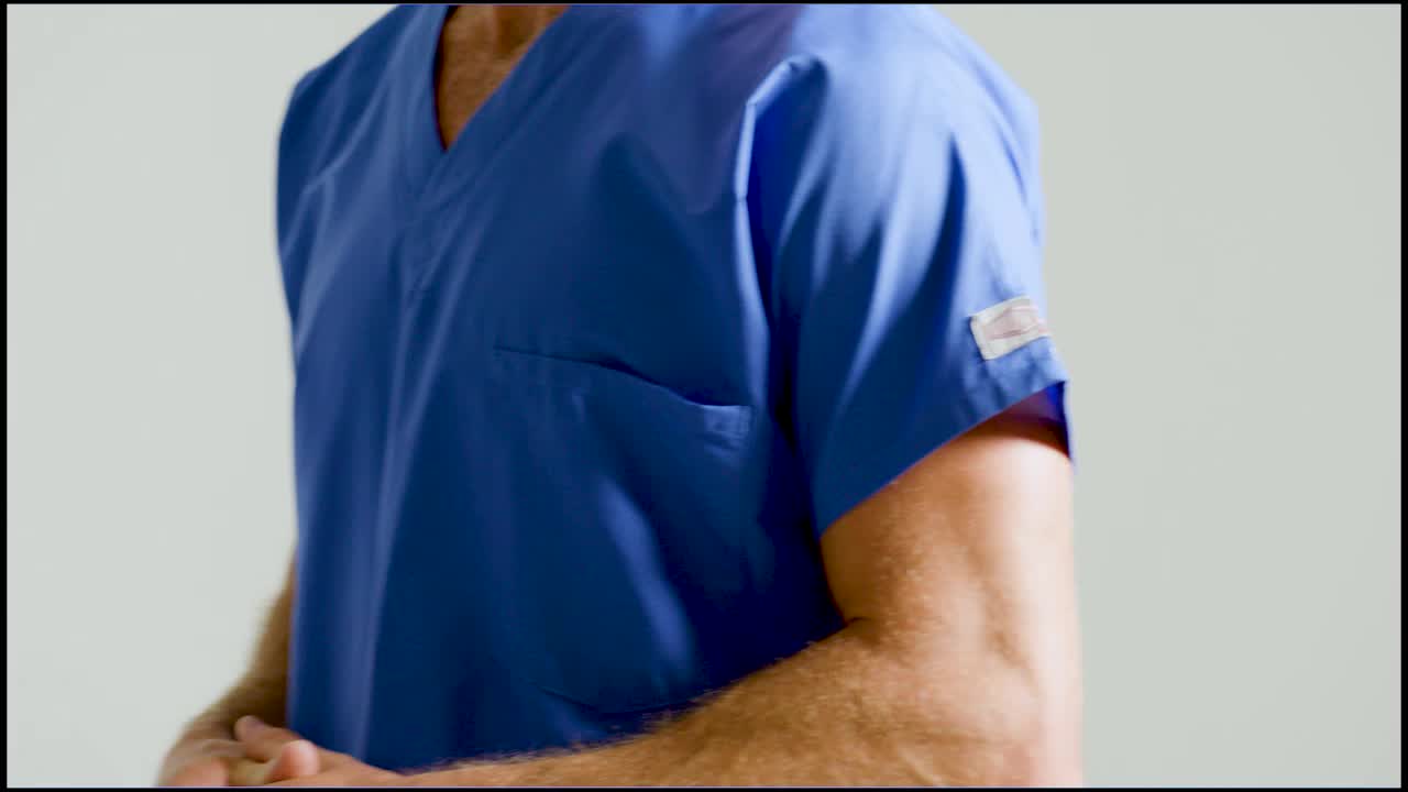 thumbnail video image 2 of Landau Scrub Zone Unisex Relaxed Fit 1-Pocket V-Neck Scrub Top 71221, 2 of 6