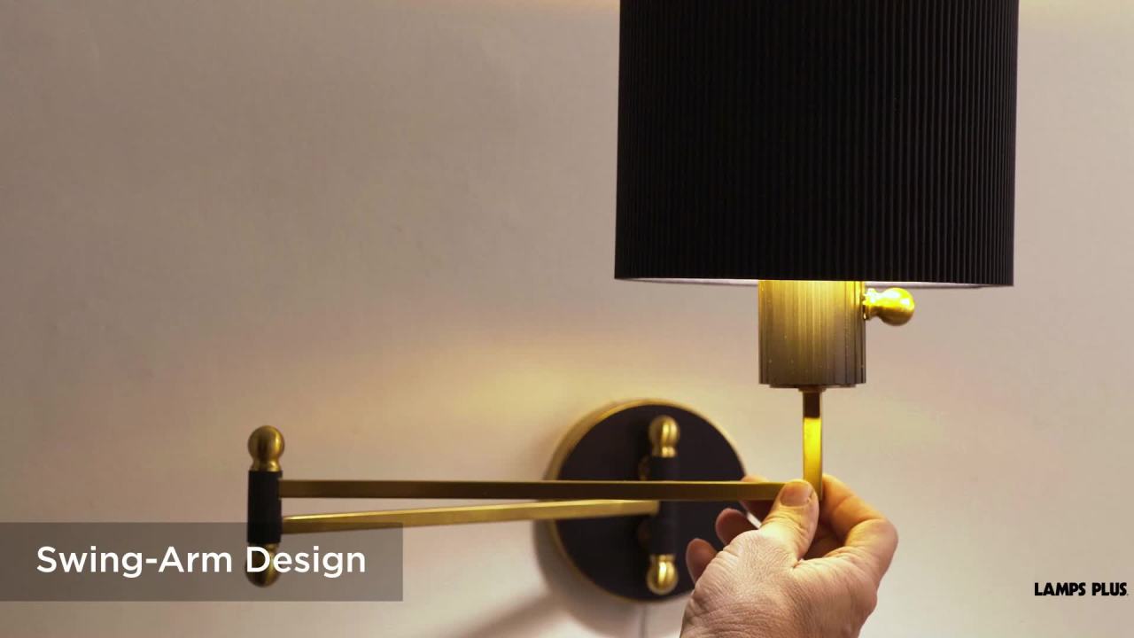 thumbnail video image 2 of Possini Euro Design Possini Euro Rumi 13 1/4"H Gold and Black Swing-Arm Plug-In Wall Lamp, 2 of 10
