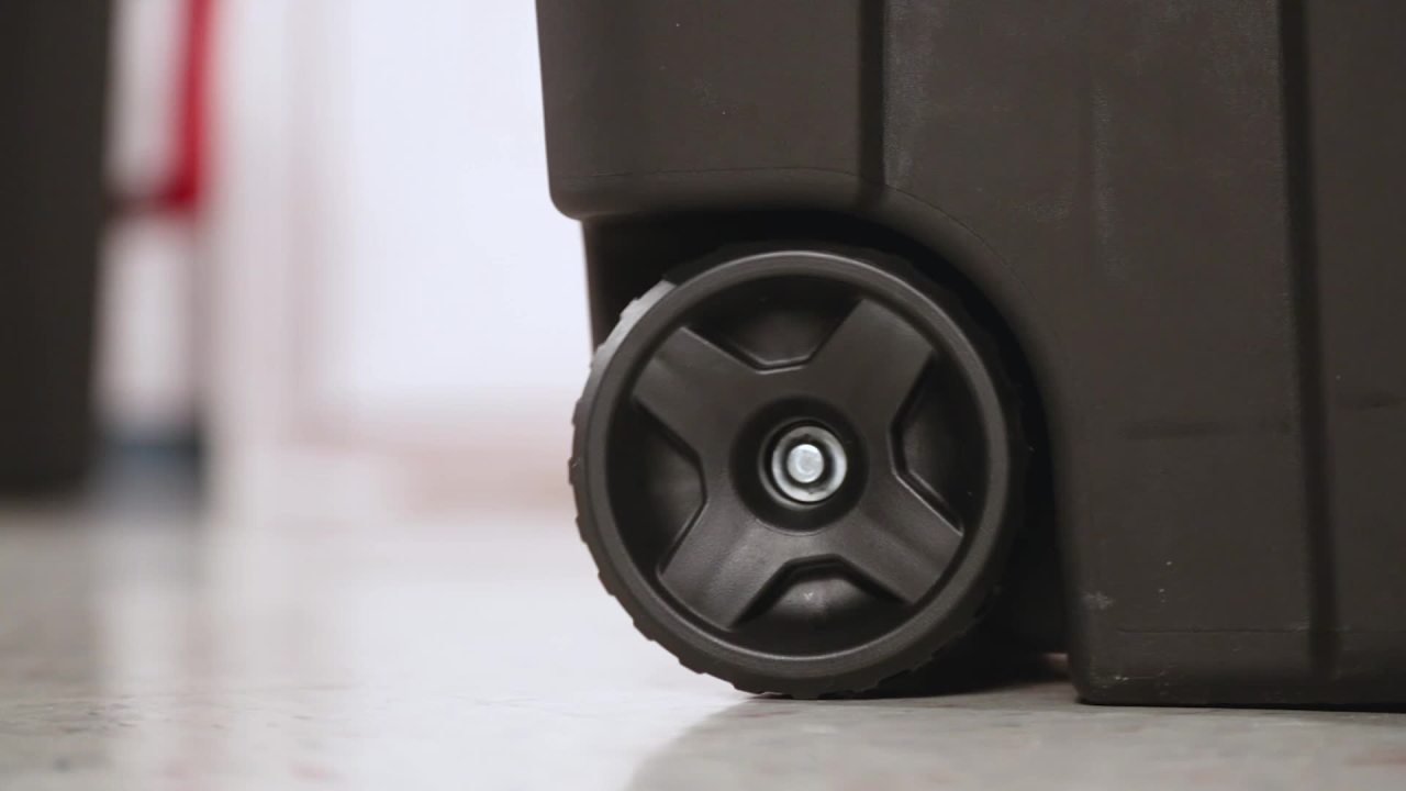 thumbnail video image 2 of Sterilite 40 Gallon Wheeled Plastic Storage Tote, Black, 2 of 5