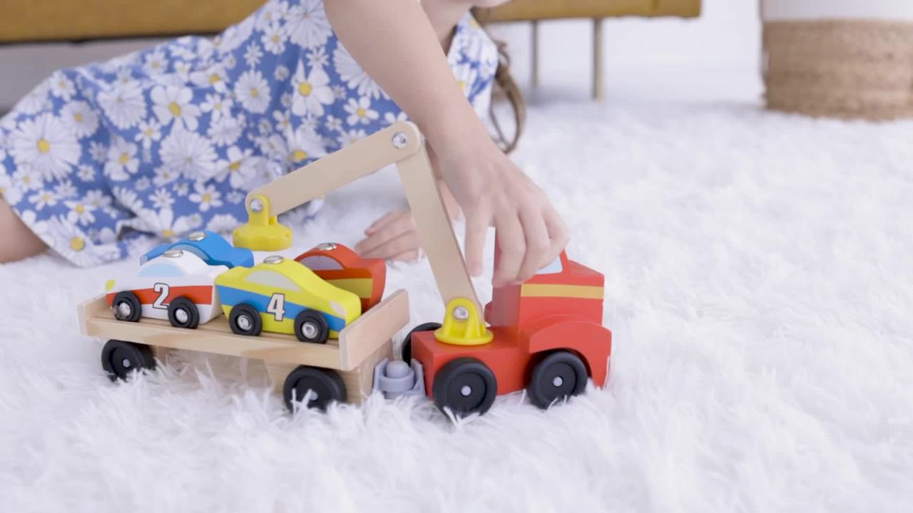 thumbnail video image 3 of Melissa & Doug Magnetic Car Loader Wooden Toy Set With 4 Cars and 1 Semi-Trailer Truck, 3 of 12