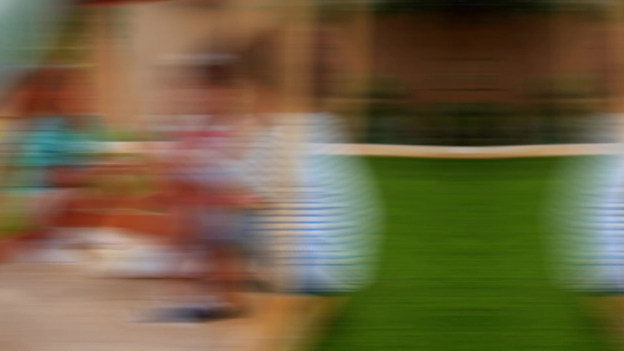 thumbnail video image 2 of KidKraft Ainsley Wooden Outdoor Swing Set with Slide and Rock Wall, 2 of 11