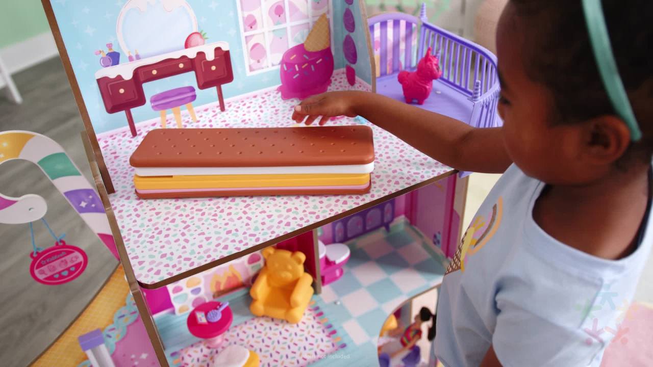 thumbnail video image 2 of KidKraft Candy Castle Wooden Dollhouse with 28 Accessories, Ages 4 & up, 2 of 12