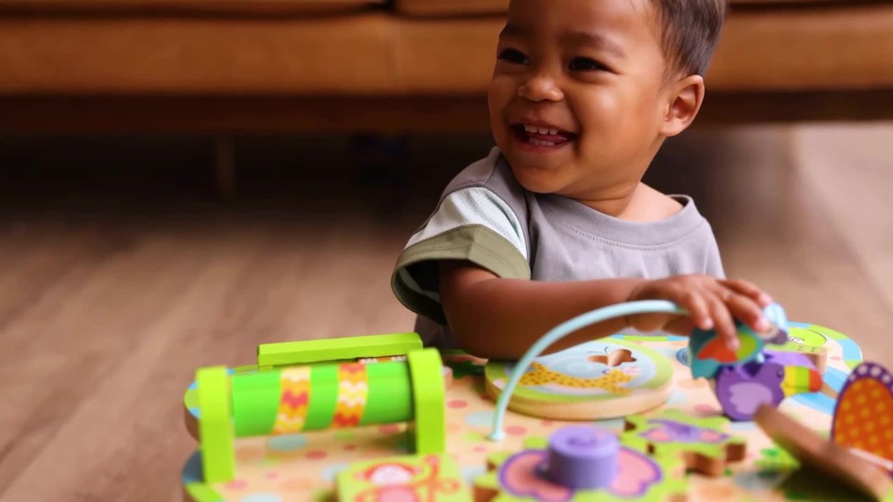 thumbnail video image 2 of Melissa & Doug First Play Children’s Jungle Wooden Activity Table for Toddlers, 2 of 10