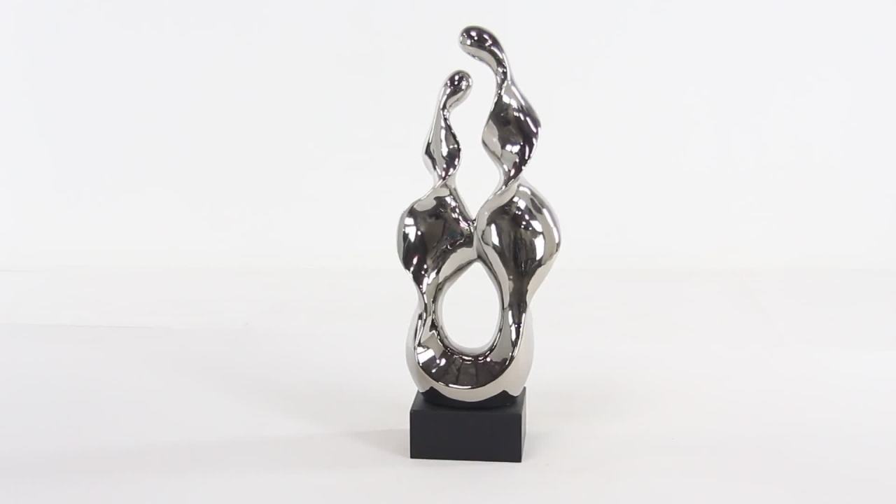 thumbnail video image 2 of 10" x 27" Silver Ceramic Wave Abstract Sculpture with Black Wooden Base, by DecMode, 2 of 19