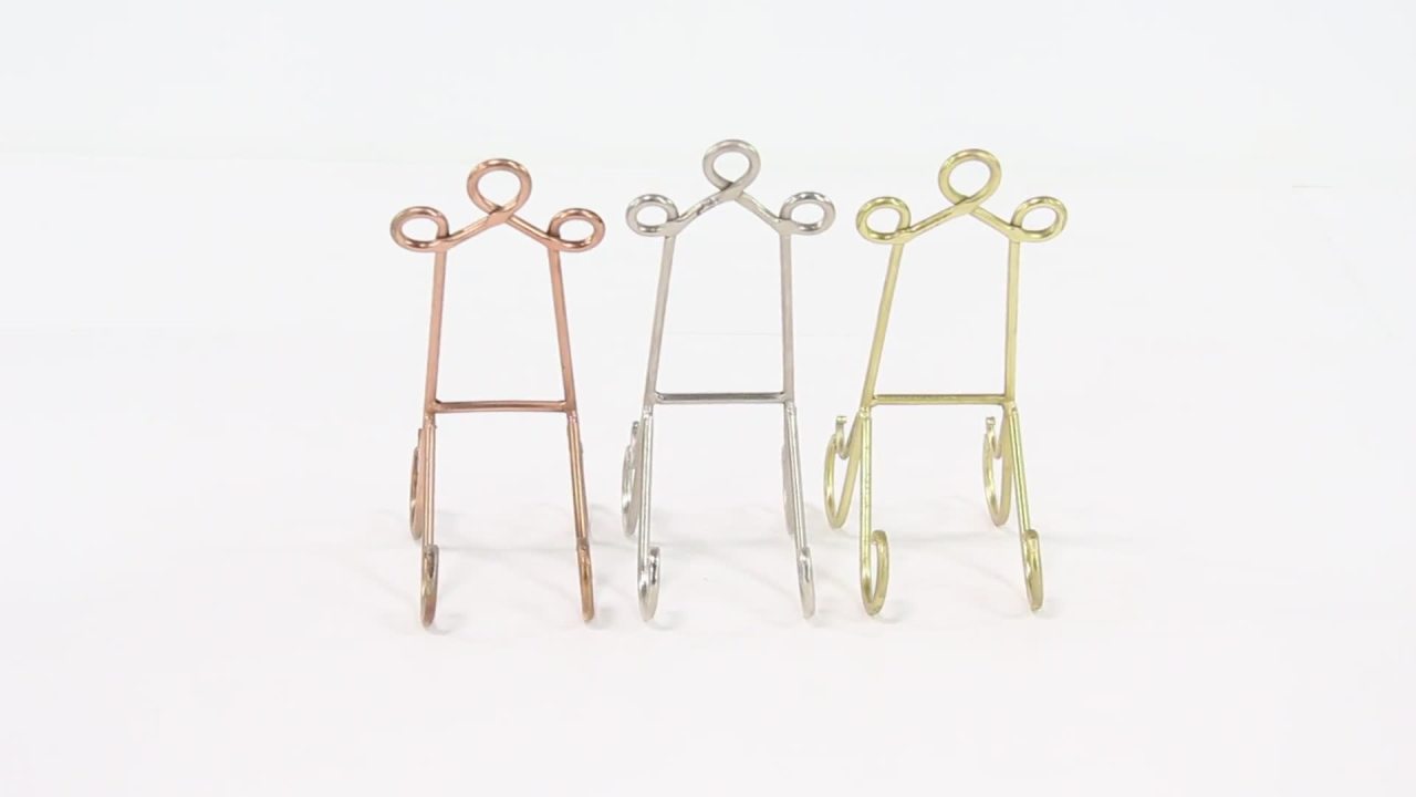 thumbnail video image 2 of DecMode 5"W, 14"H Multi Colored Metal Tabletop Triangle Scroll Easel, 3-Pieces, 2 of 9