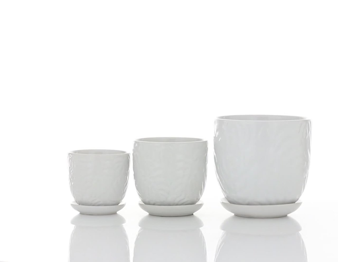 thumbnail video image 2 of DecMode 8", 6", 5"H Indoor Outdoor White Porcelain Planter with Attached Saucer (3 Count), 2 of 10