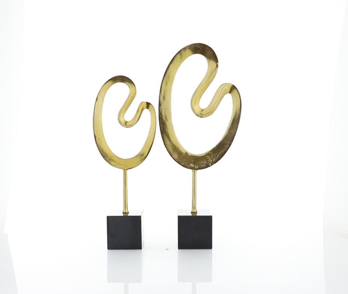 thumbnail video image 2 of 24", 21"H Gold Marble Abstract Sculpture with Black Base, by CosmoLiving by Cosmopolitan (2 Count), 2 of 9