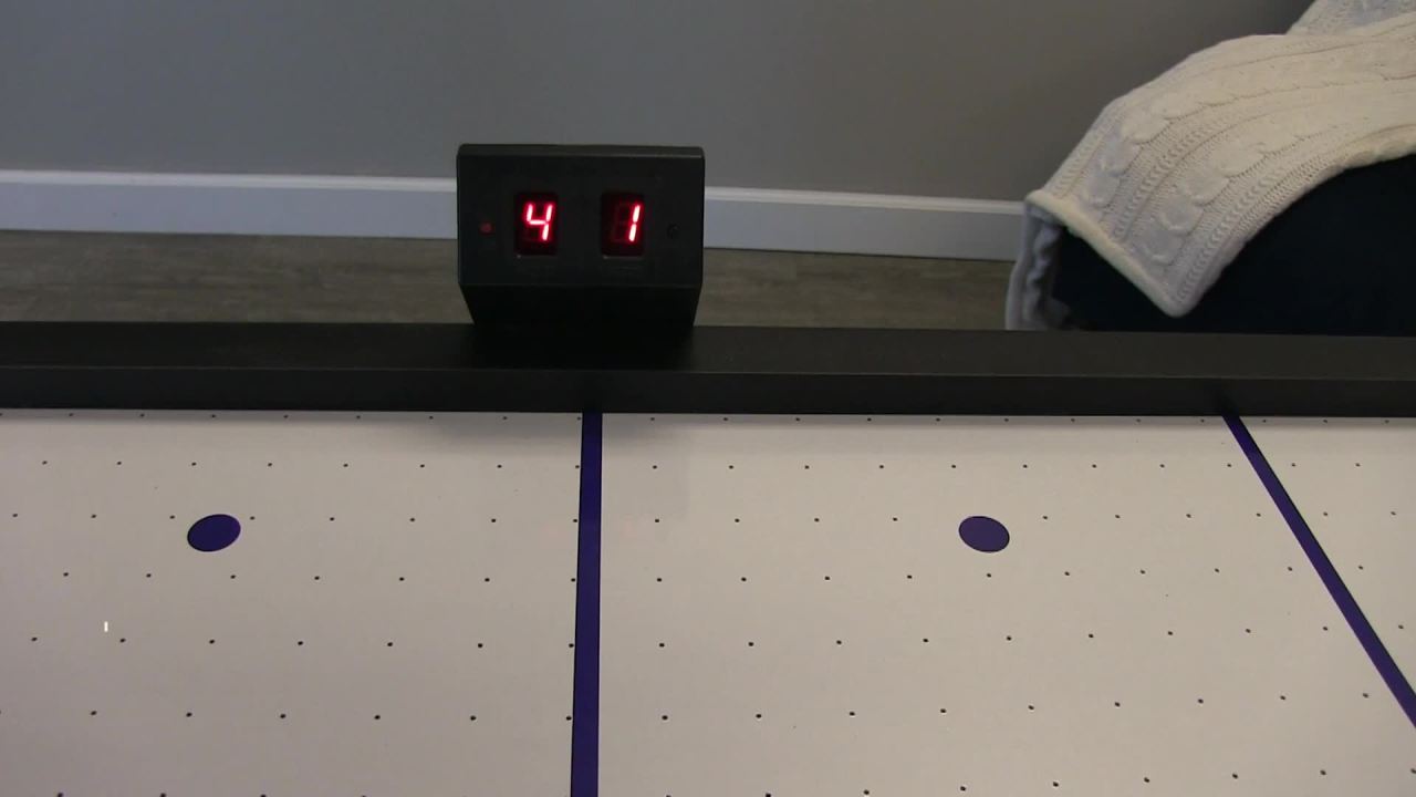 thumbnail video image 2 of Hathaway Face-Off 5-Foot Air Hockey Game Table for Family Game Rooms with Electronic Scoring, 2 of 8