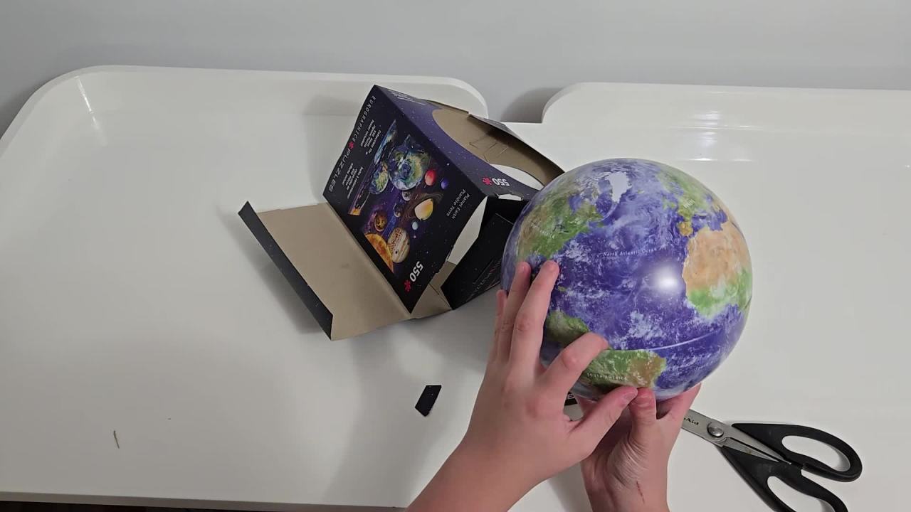 thumbnail video image 2 of Eurographics: Puzzle Tin: Planet Earth - 550 Piece Jigsaw - Collectible Decorative Globe Shaped Gift Tin, 13" x 19" Assembled, High-Quality Materials, 2 of 6