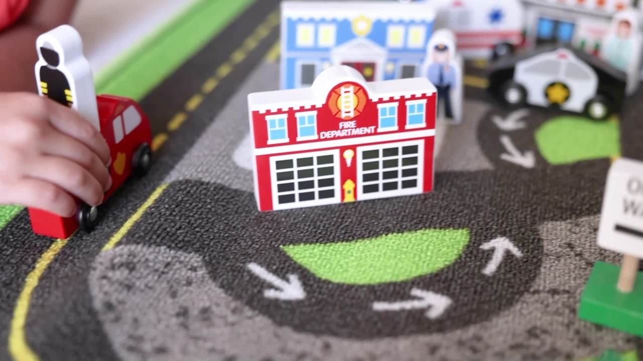 thumbnail video image 2 of Melissa & Doug Deluxe Activity Road Rug Play Set with 49 Wooden Vehicles and Play Pieces, 2 of 10