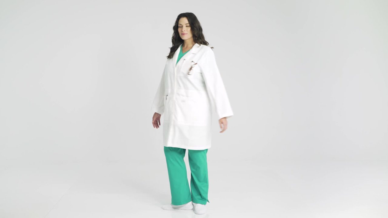 thumbnail video image 2 of Landau Women's Essential Lab Coats Classic Relaxed Fit Breathable Fade Resistant 5 Pockets Button Full-Length Notebook Lab Coat Scrub, Style 3165, 2 of 3
