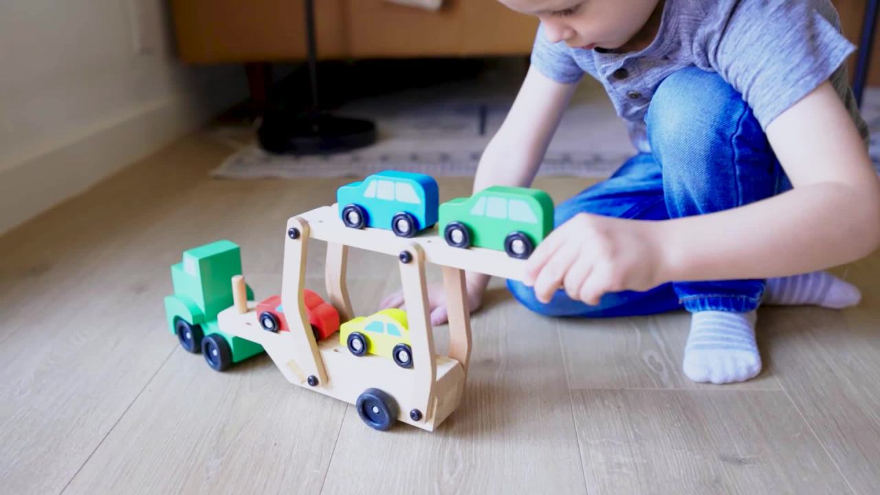 thumbnail video image 2 of Melissa & Doug Car Carrier Truck and Cars Wooden Toy Set With 1 Truck and 4 Cars, 2 of 10