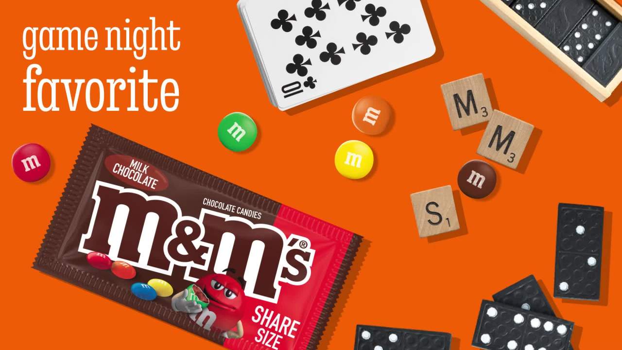 thumbnail video image 2 of M&M'S Milk Chocolate Candy Pouch, Sharing Size, 3.14 oz, 2 of 14