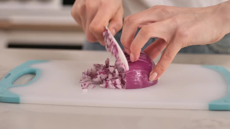 thumbnail video image 2 of Farberware Professional 5-inch Ceramic Santoku Knife with Teal Blade Cover and Handle, 2 of 9