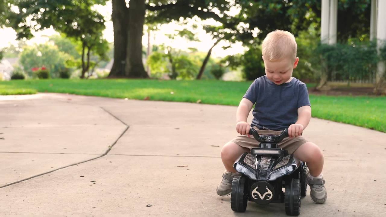 thumbnail video image 3 of Dynacraft Realtree Foot to Floor Boys Kids Ride-on for Age 1.5-3 Years, 3 of 13