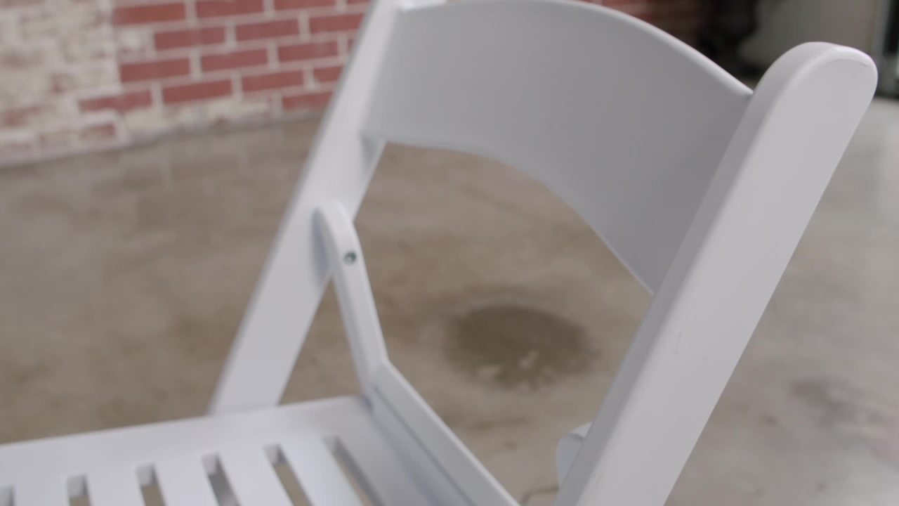 thumbnail video image 2 of Flash Furniture HERCULES Series 1000 lb. Capacity White Resin Folding Chair with Slatted Seat, 2 of 14