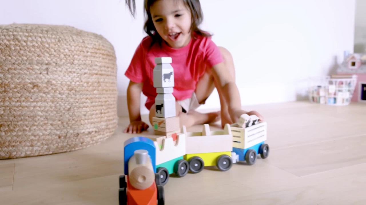 thumbnail video image 2 of Melissa & Doug Wooden Farm Train Set - Classic Wooden Toy (3 linking cars), 2 of 10