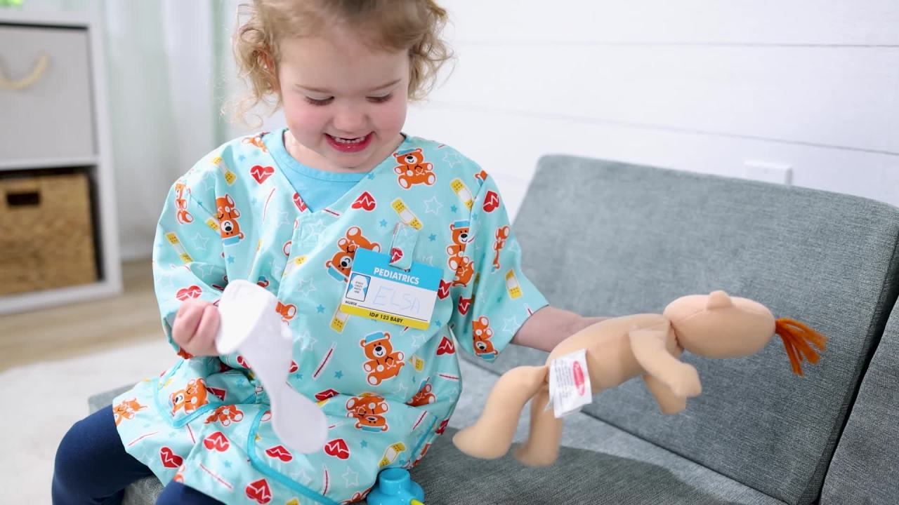 thumbnail video image 2 of Melissa & Doug Pediatric Nurse Costume Role Play Set (8 pcs) - Includes Baby Doll, Stethoscope, 2 of 10