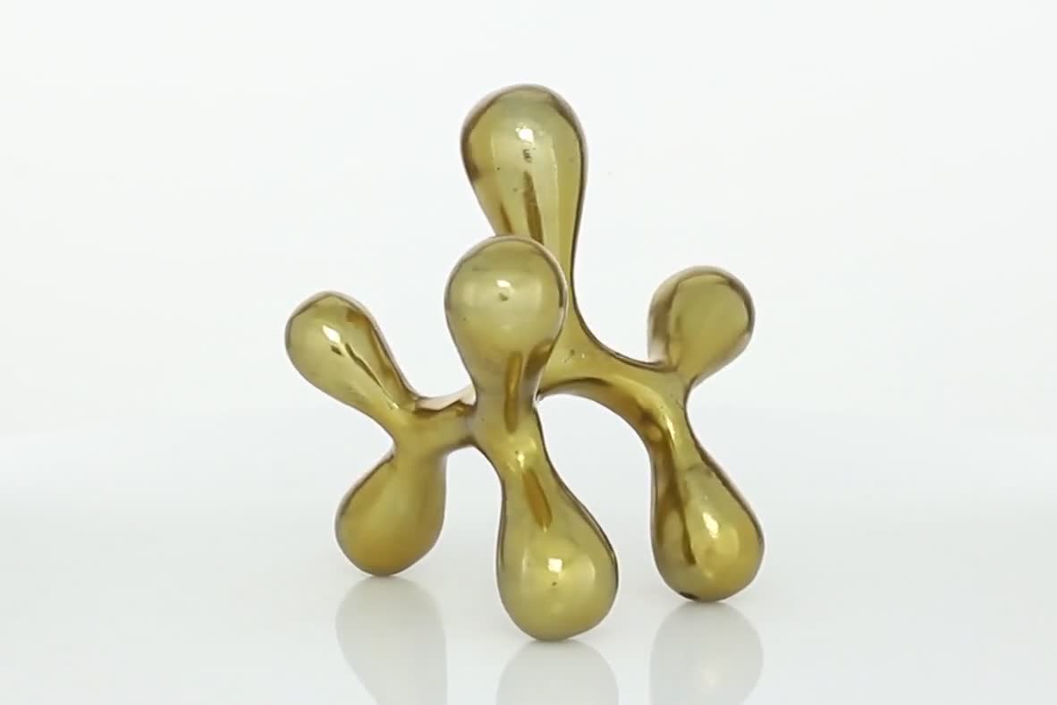 thumbnail video image 2 of 11" x 12" Gold Aluminum Metal Abstract Sculpture, by CosmoLiving by Cosmopolitan, 2 of 10