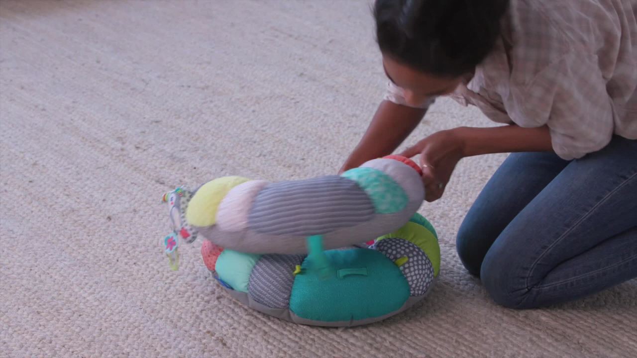 thumbnail video image 3 of Infantino 2-in-1 Tummy Time & Seated Support Activity Gym for Ages 6-12 Months, Multicolor Toucan, 3 of 11