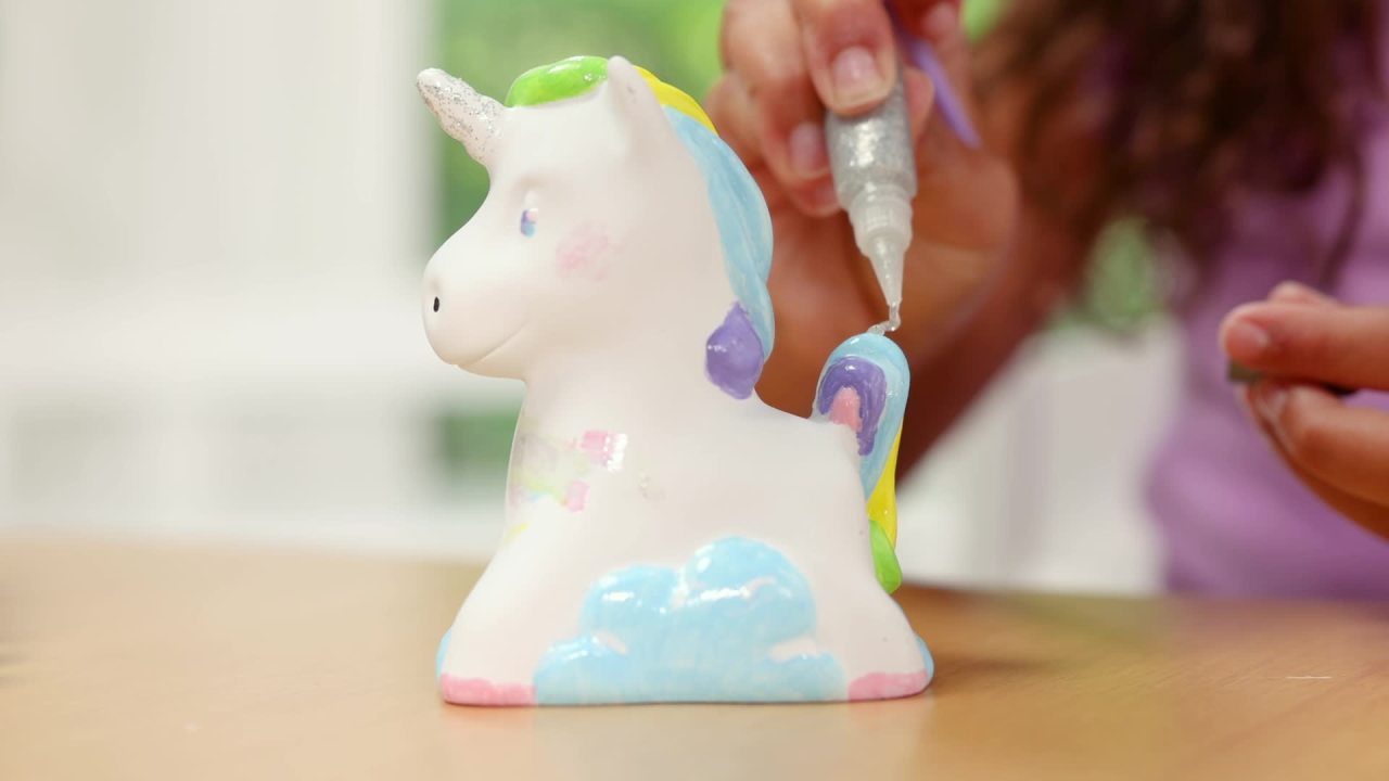 thumbnail video image 2 of Melissa & Doug Created by Me! Decorate-Your-Own Unicorn Bank Craft Kit With 6 Pots of Paint, Glitter Glue, Paintbrush, 2 of 10