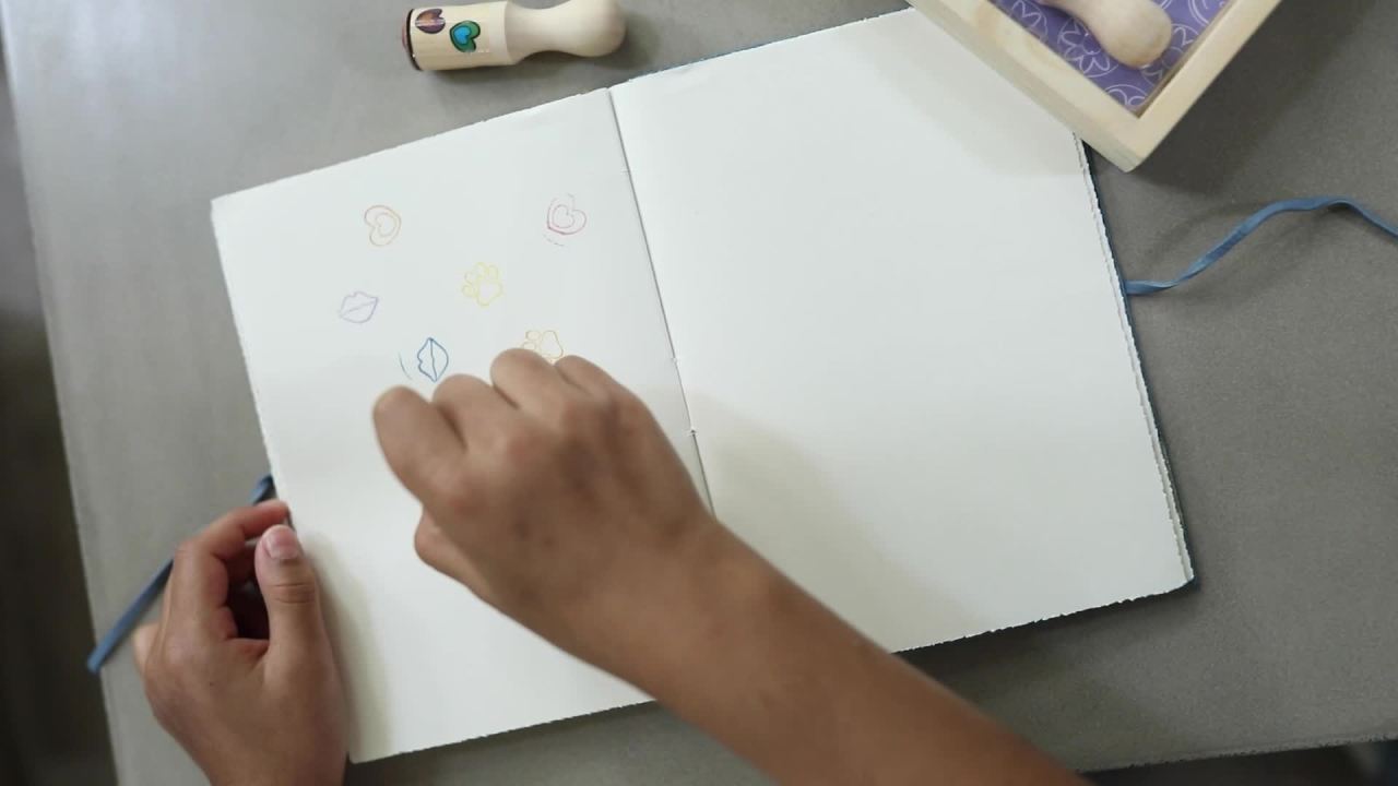 thumbnail video image 2 of Melissa & Doug Happy Handles Wooden Stamp Set: 6 Stamps and 6-Color Stamp Pad, 2 of 10