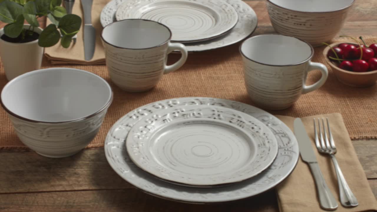 thumbnail video image 3 of Pfaltzgraff® Trellis White Stoneware 16-Piece Dinnerware Set, 3 of 8