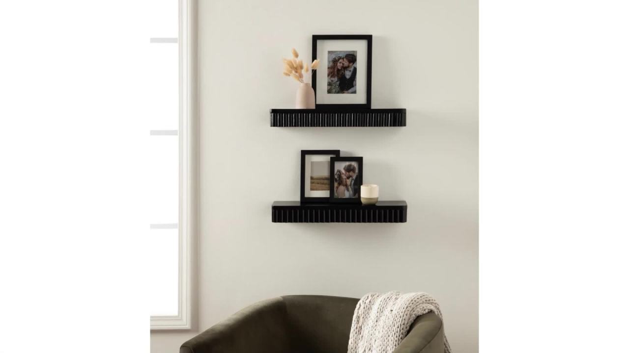 thumbnail video image 2 of Kate and Laurel Reid Modern Ribbed Wood Floating Shelves, Set of 2, 20 Inches, Black, Decorative Floating Shelf Set for Use as Cute Nursery Book Shelves or Living Room Gallery Wall Decor, 2 of 11