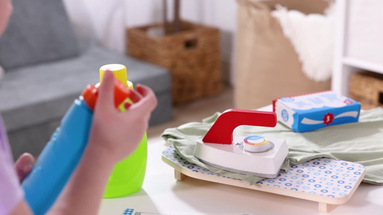 thumbnail video image 2 of Melissa & Doug Laundry Basket Play Set With Wooden Iron, Ironing Board, and Accessories (14 Pcs), 2 of 10