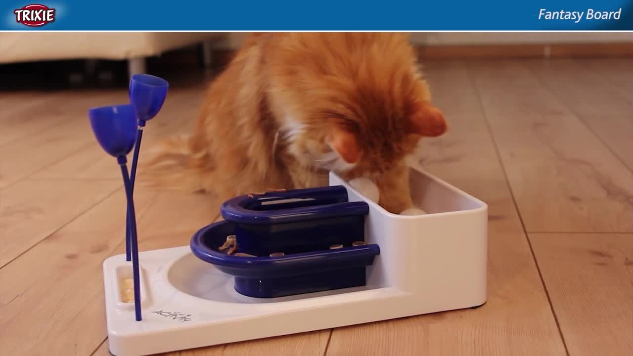 thumbnail video image 2 of TRIXIE Fantasy Board Strategy Game for Cats, Puzzle Toy, Treat Dispenser, Interactive Play, Mauve/Mint, 2 of 9