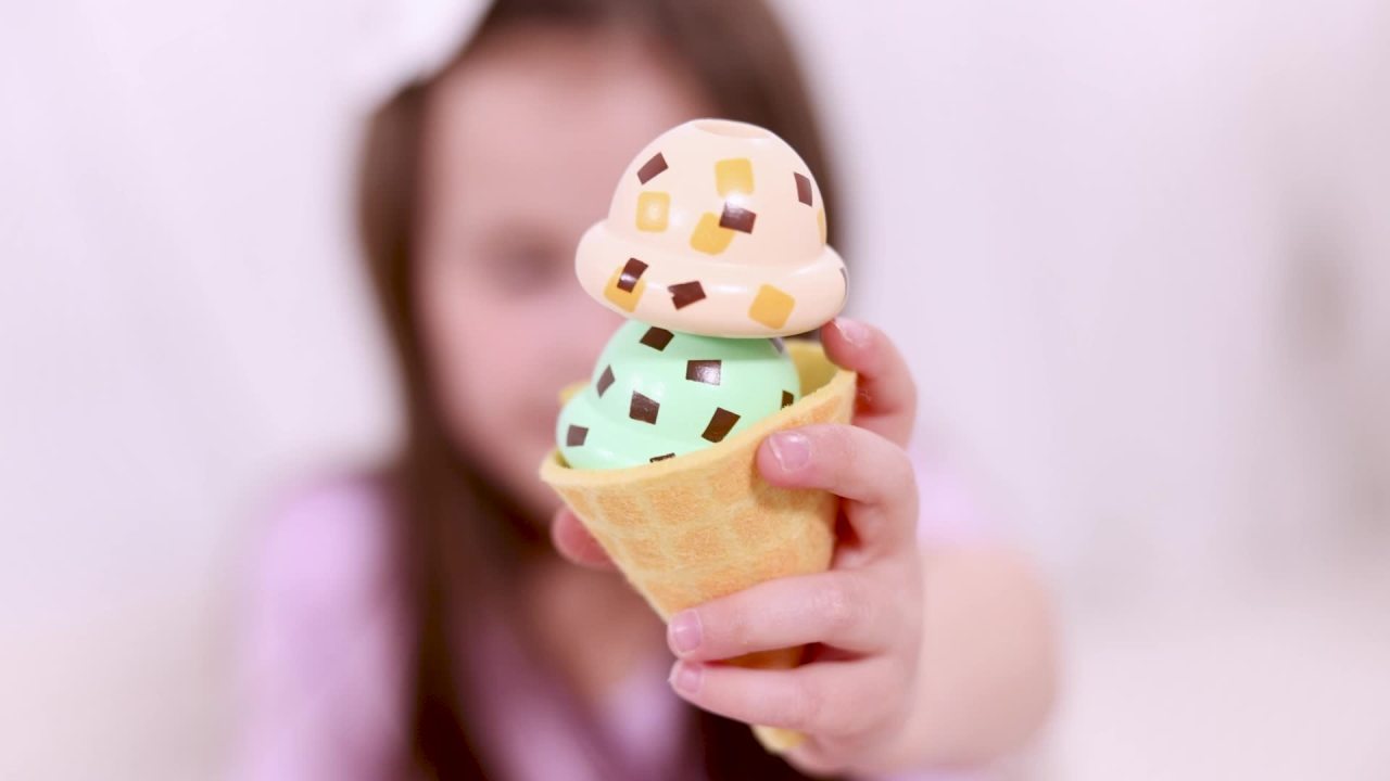 thumbnail video image 3 of Melissa & Doug Cool Scoops Ice Creamery Wooden Counter with Play Food Preschool Toy - FSC Certified, 3 of 11