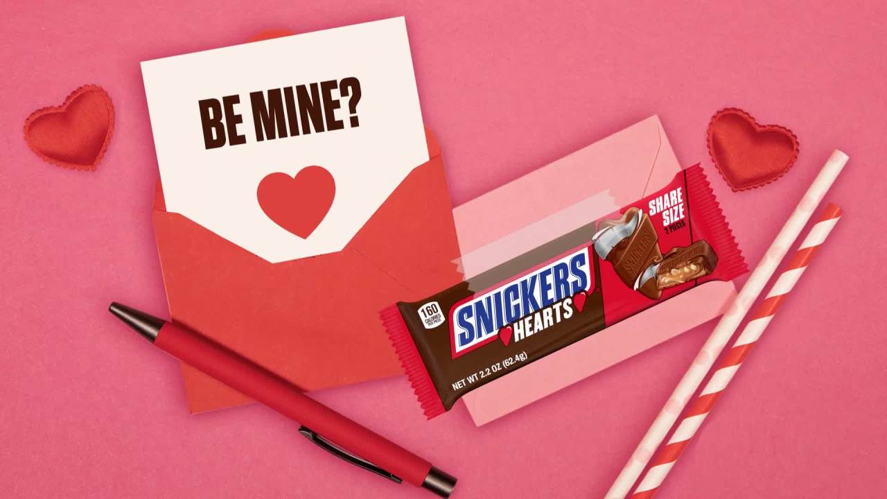 thumbnail video image 2 of Snickers Milk Chocolate Hearts Valentines Day Candy Bars, Share Size - 2.2 oz Pack, 2 of 13