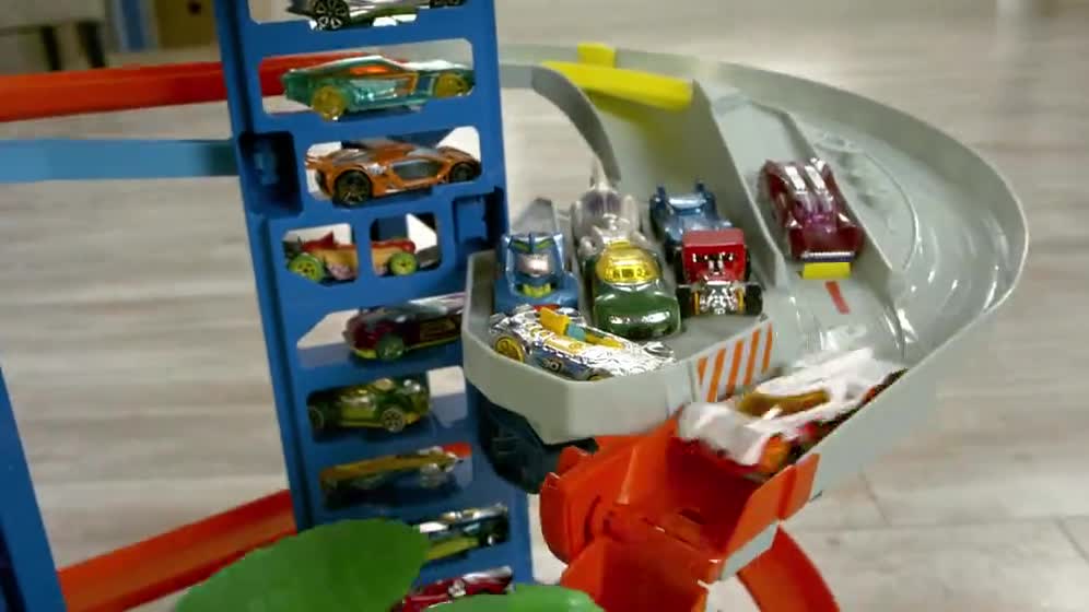 thumbnail video image 2 of Hot Wheels HW Ultimate Garage Playset with 2 Toy Cars, Stores 100+ 1:64 Scale Vehicles, 2 of 7