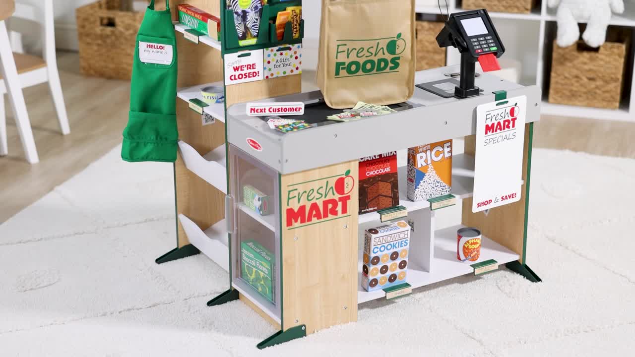 thumbnail video image 2 of Melissa & Doug Fresh Mart Grocery Store Play Food and Role Play Companion Set, 2 of 11
