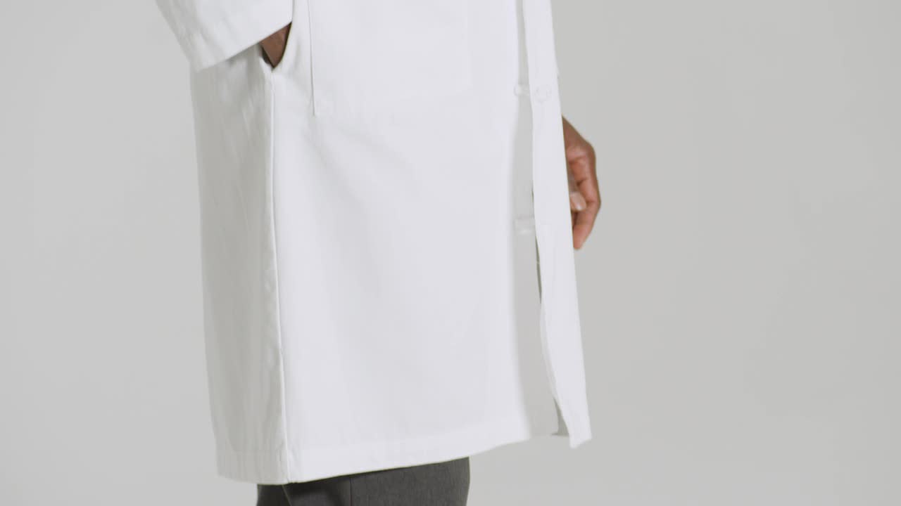 thumbnail video image 2 of Landau Men's Essential Lab Coats Classic Relaxed Fit Breathable 3 Pockets Button Full-Length Lab Coat Scrub, Style 3138, 2 of 5