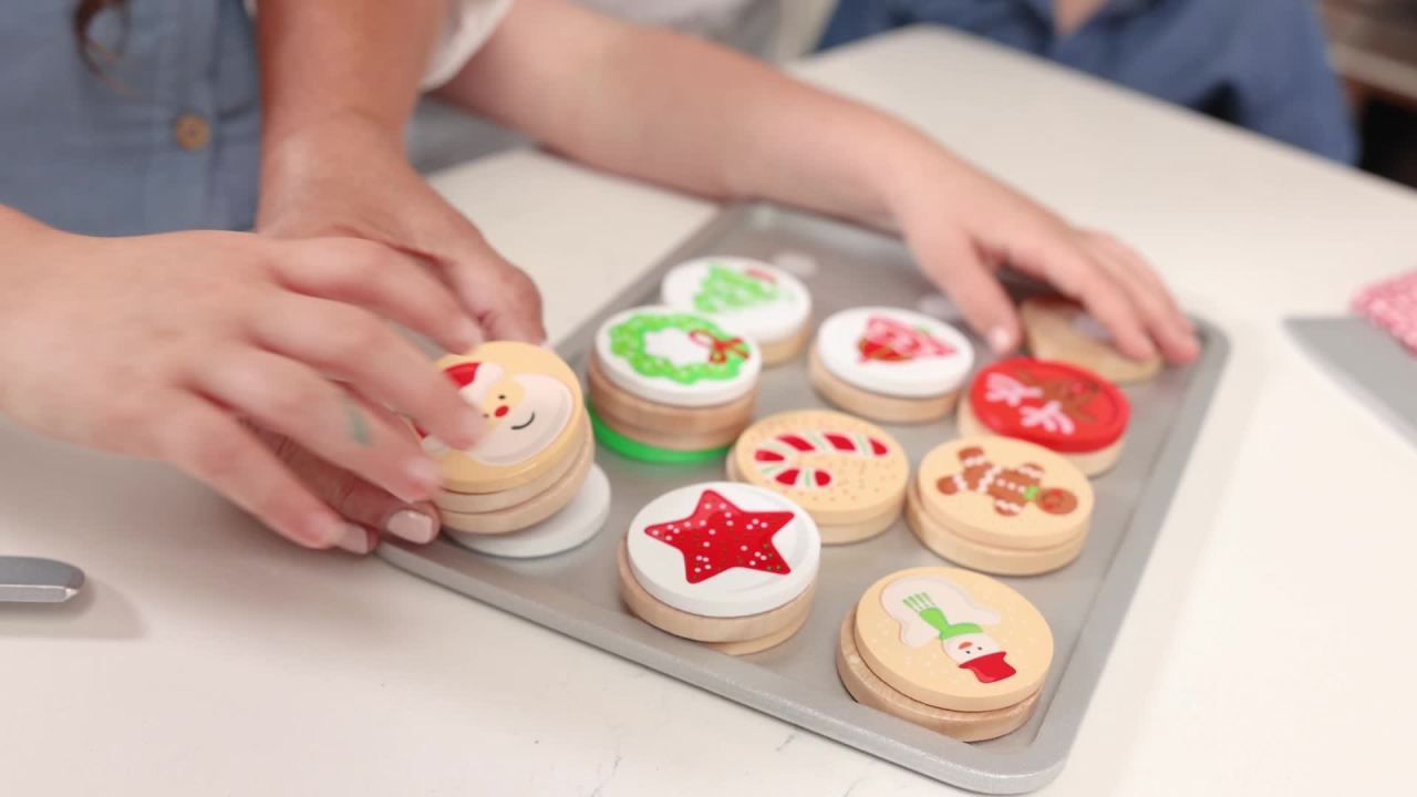thumbnail video image 3 of Melissa & Doug Slice and Bake Wooden Christmas Cookie Play Food Set, 3 of 6