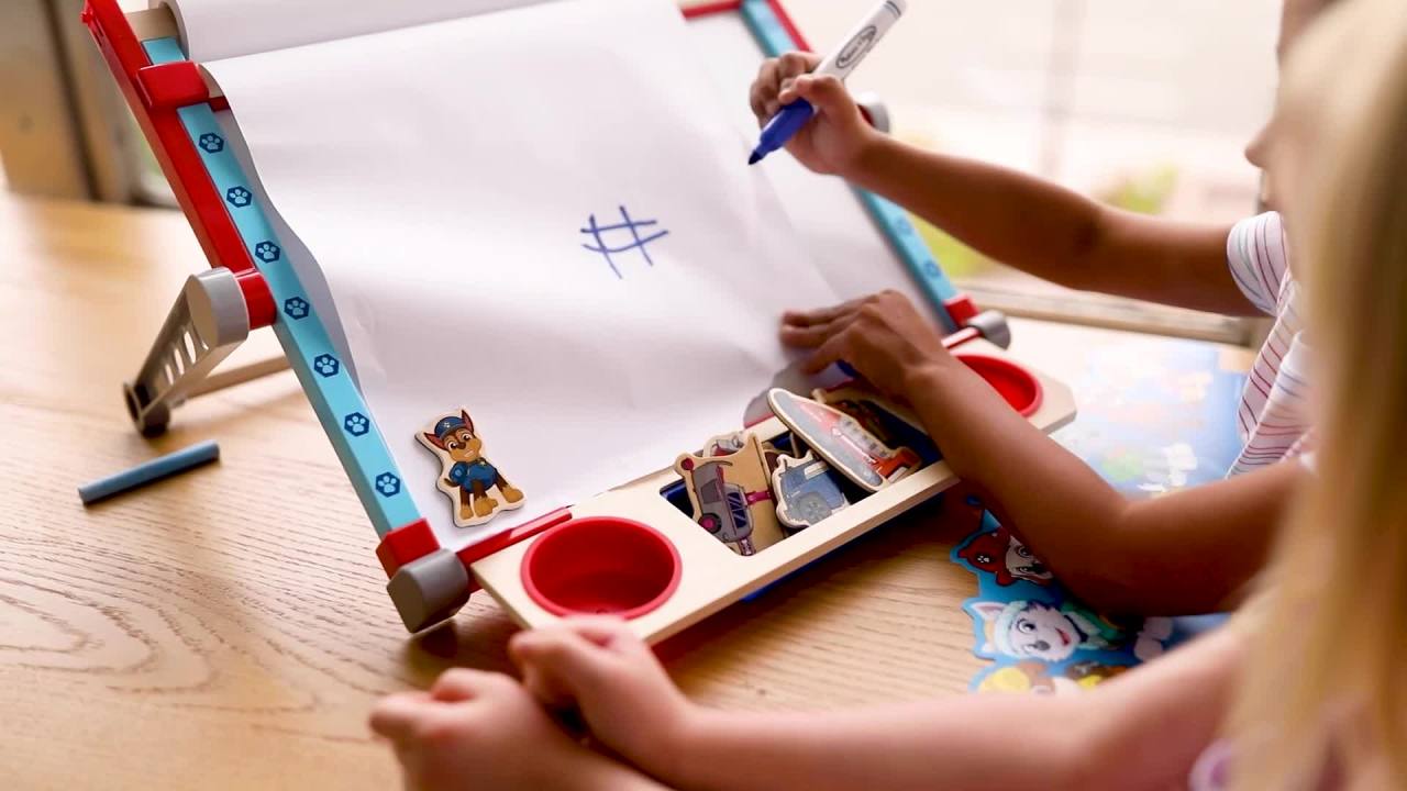 thumbnail video image 2 of Melissa & Doug PAW Patrol Wooden Double-Sided Tabletop Art Center Easel (33 Pieces), 2 of 10