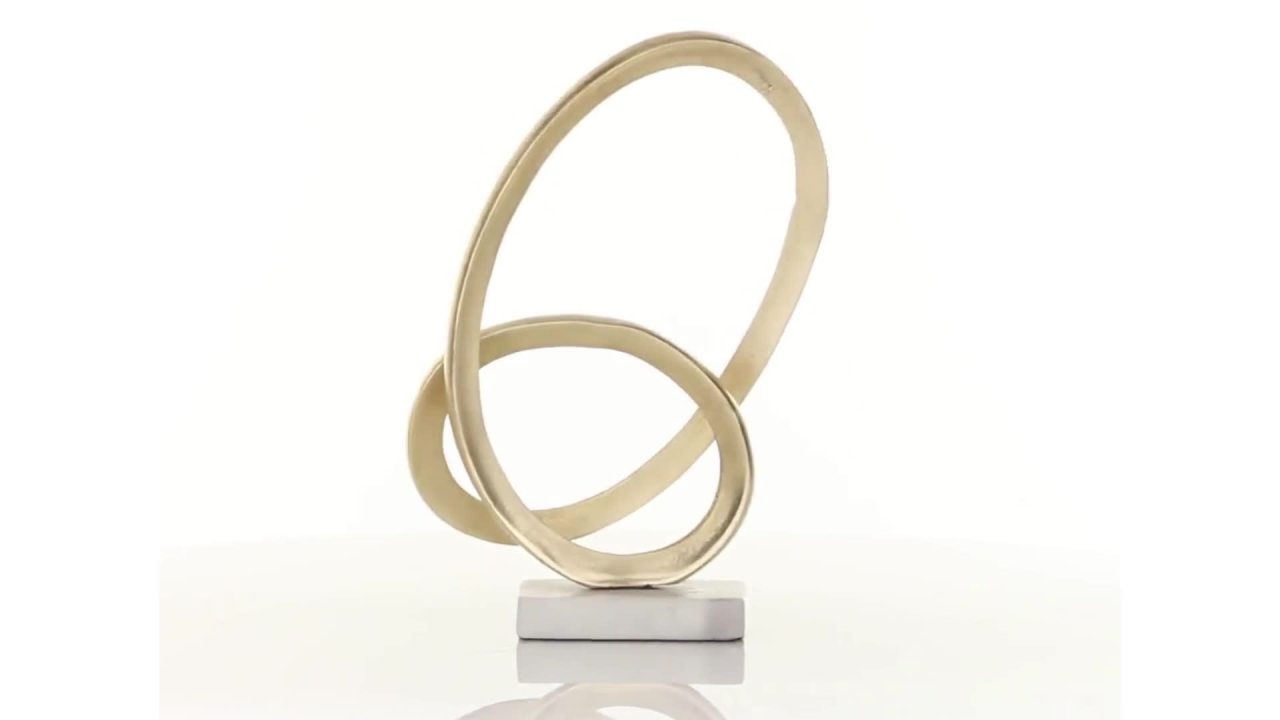 thumbnail video image 2 of 12" x 17" Gold Aluminum Metal Loop Geometric Sculpture with Marble Base, by CosmoLiving by Cosmopolitan, 2 of 12