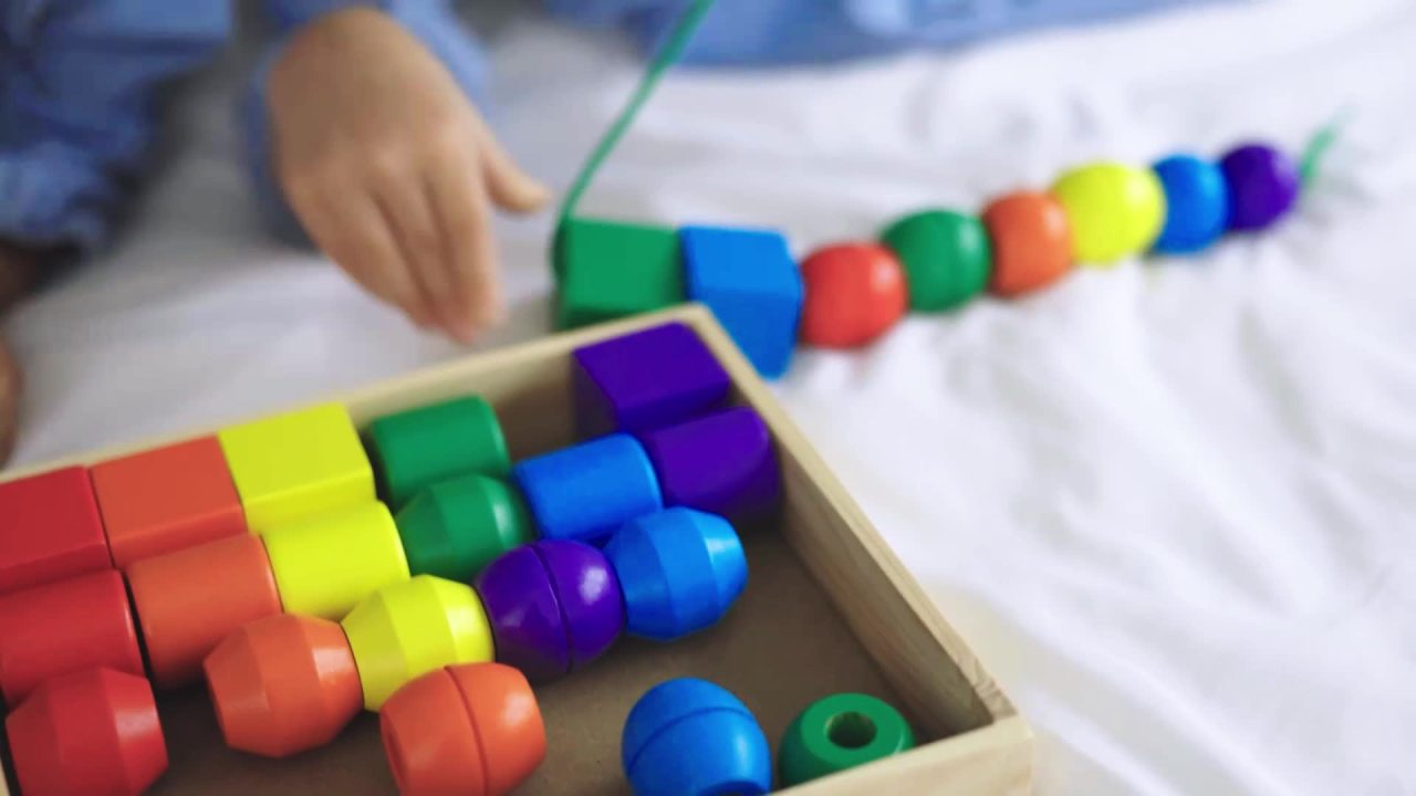 thumbnail video image 5 of Melissa & Doug Primary Lacing Beads - Educational Toy With 8 Wooden Beads and 2 Laces, 5 of 5