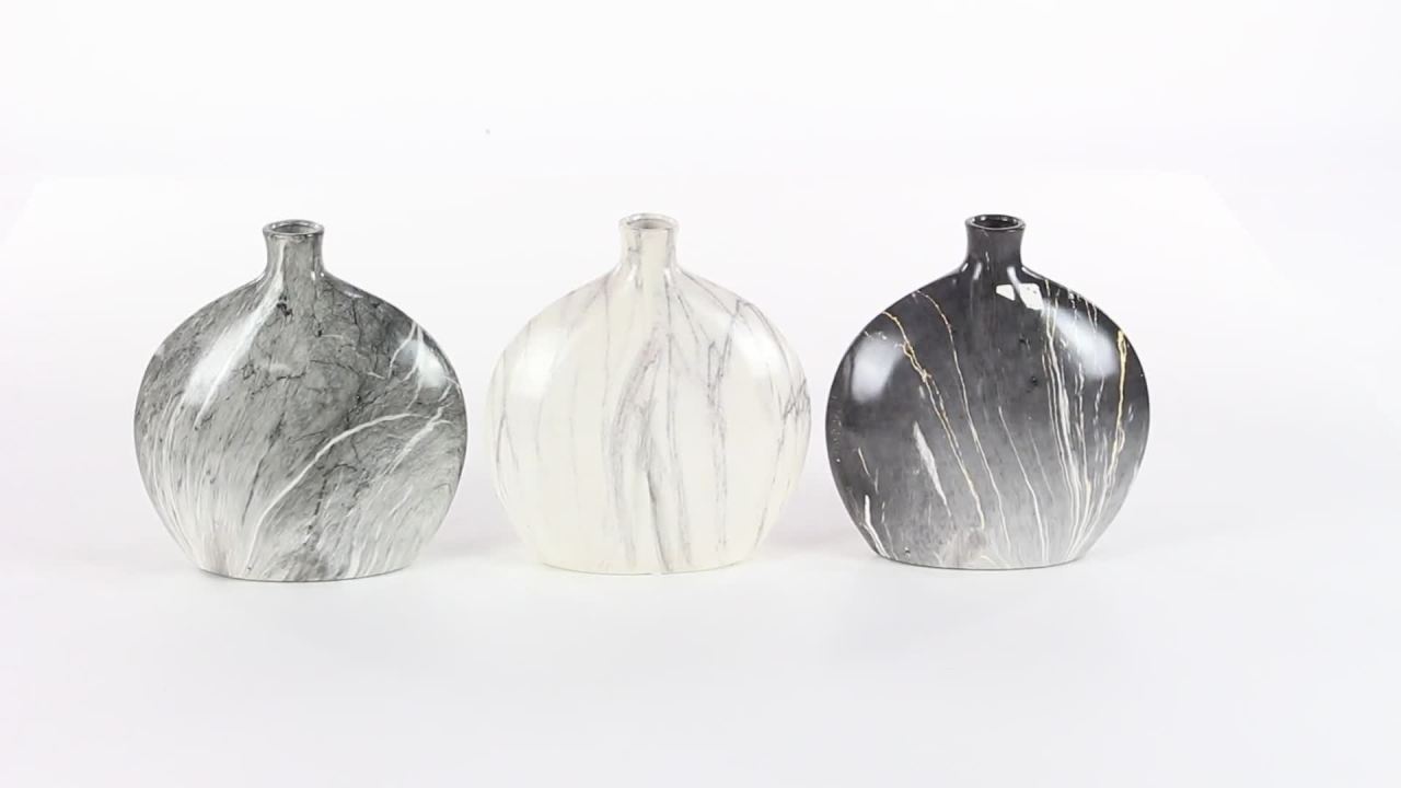 thumbnail video image 2 of DecMode 9"W, 10"H Faux Marble Gray Ceramic Vase, Set of 3, 2 of 12