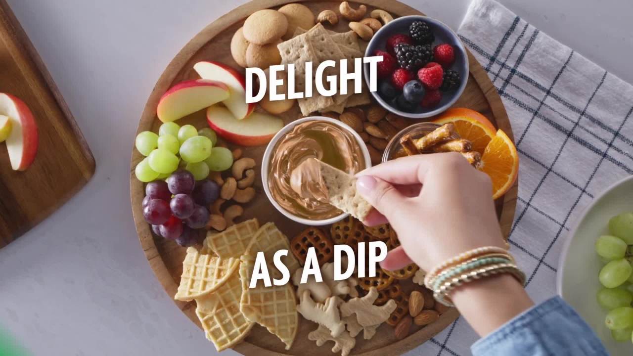 thumbnail video image 2 of Jif To Go Creamy Peanut Butter, 8- 1.5 Ounce Cups, Smooth and Creamy Texture, Snack Size Packs, 2 of 9