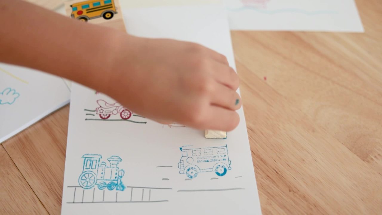 thumbnail video image 2 of Melissa & Doug Deluxe Wooden Stamp and Coloring Set – Vehicles (30 Stamps, 6 Markers, 2 Durable 2-Color Stamp Pads), 2 of 10