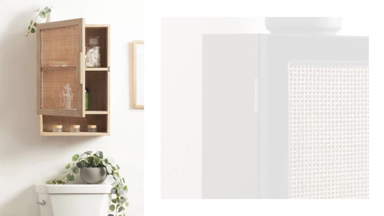 thumbnail video image 2 of Kate and Laurel Ori Transitional Cane Wall Cabinet with Door, 15 x 7 x 24, Black and Natural Rattan, Decorative Rattan Over the Toilet Cabinet with Two Shelves and Bonus Storage Cubby, 2 of 12