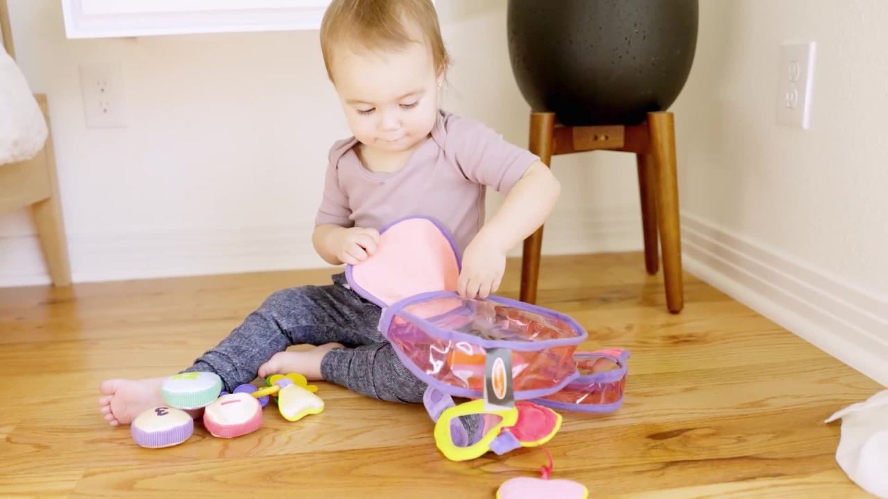 thumbnail video image 2 of Melissa & Doug Pretty Purse Fill and Spill Soft Play Set Toddler Toy, 2 of 10