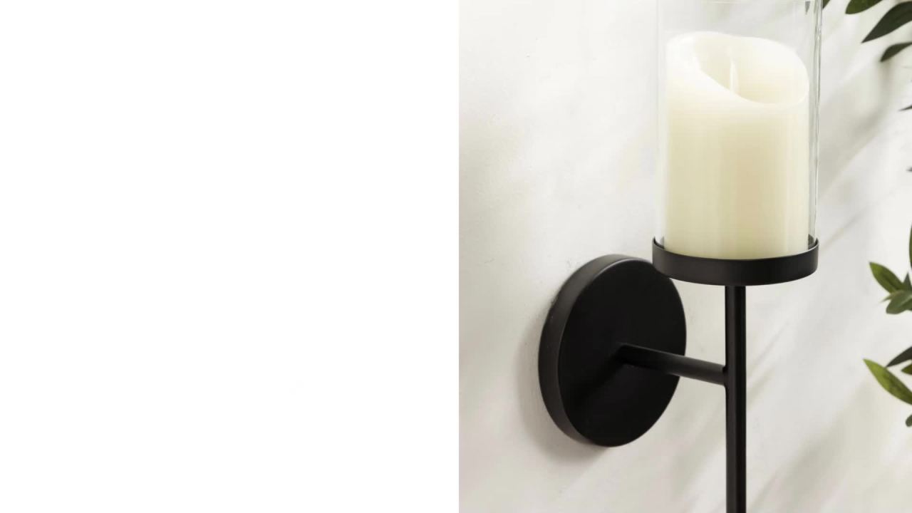 thumbnail video image 2 of Kate and Laurel Blaise Transitional Metal Wall Sconce, 5 x 6 x 14, Antique Brass, Modern Round Candle Holder with Removable Glass Cylinder for Flameless Candles, 2 of 9