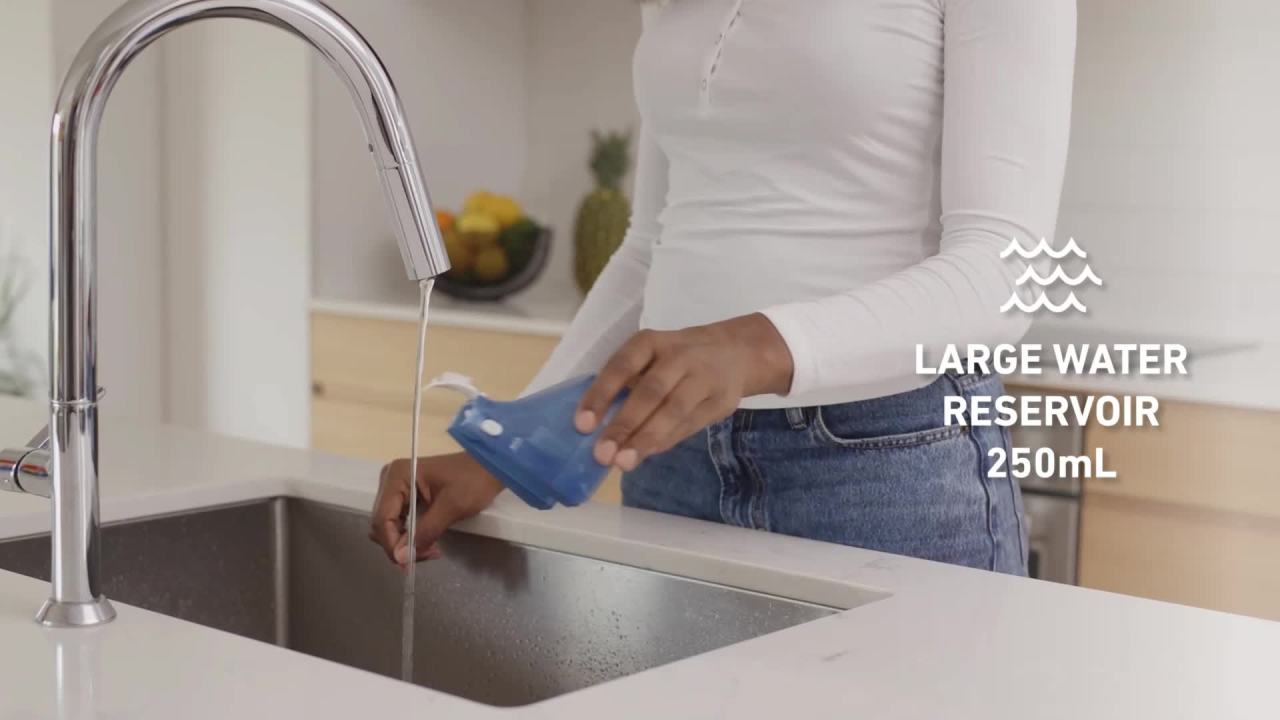 thumbnail video image 2 of Sunbeam 1200W Power Steam Handheld Steamer with Extra Burst of Steam Feature, White and Blue Finish, 2 of 10