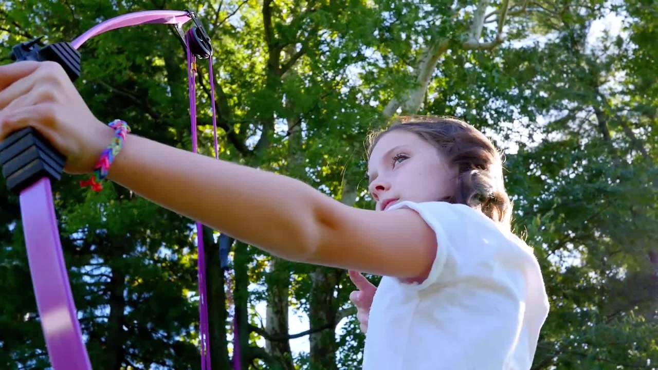 thumbnail video image 2 of Bear Archery Scout Youth Bow Set Includes Arrows, Armguard, Arrow Quiver, and Recommended for Ages 4 to 7 -&nbsp;Flo Purple, 2 of 7