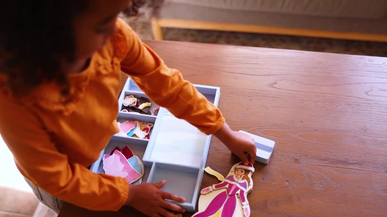 thumbnail video image 2 of Melissa & Doug Disney Belle Magnetic Dress-Up Wooden Doll Pretend Play Set, 2 of 10